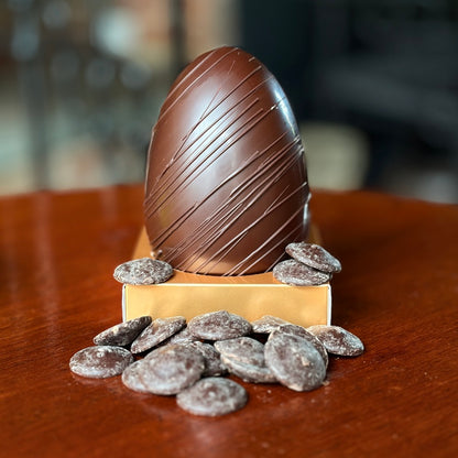 A handcrafted dark chocolate Easter Egg. Rich, decadent and filled with dark chocolate buttons. Vegetarian and vegan friendly!