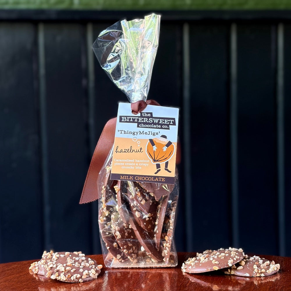 Hazelnut ThingyMeJigs — milk chocolate disks with caramelised hazelnut pieces — The Bittersweet Chocolate Co. 