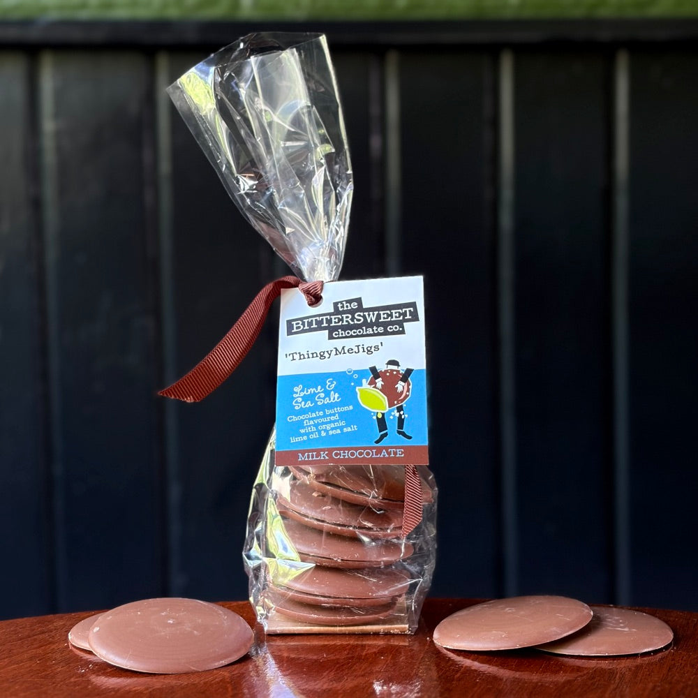Lime and Sea Salt ThingyMeJigs — milk chocolate disks with organic lime oil and sea salt — The Bittersweet Chocolate Co. 