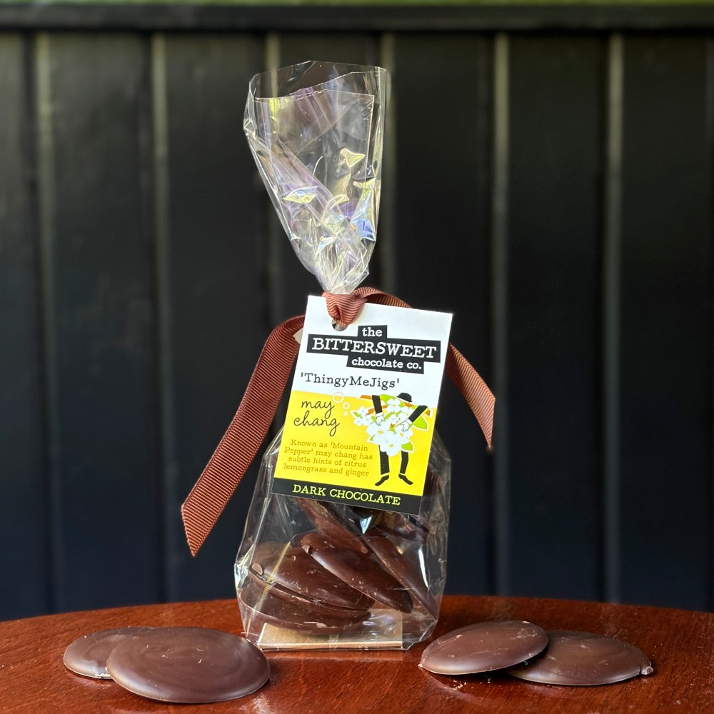May Chang ThingyMeJigs — dark chocolate disks with citrus May Chang oil — The Bittersweet Chocolate Co. 